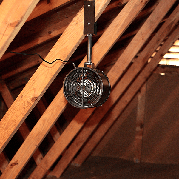 Photo of installed pipe fan in attic space