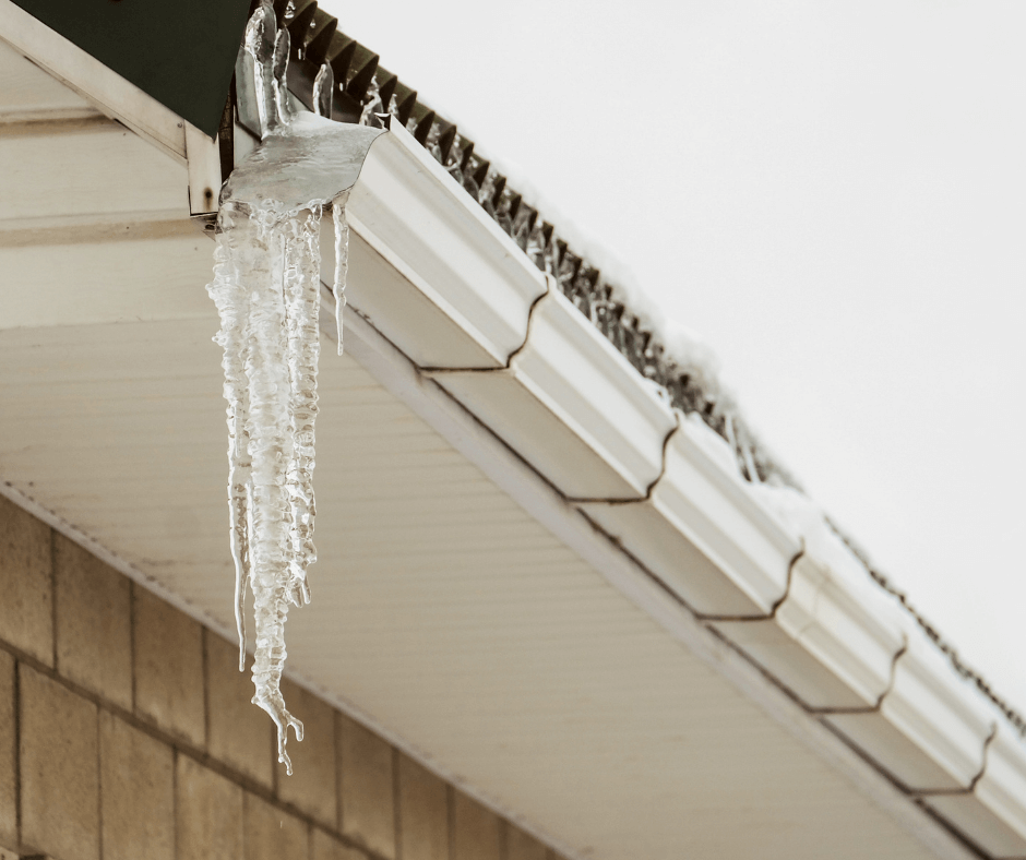 Picture of Icicles hanging from gutter of a house