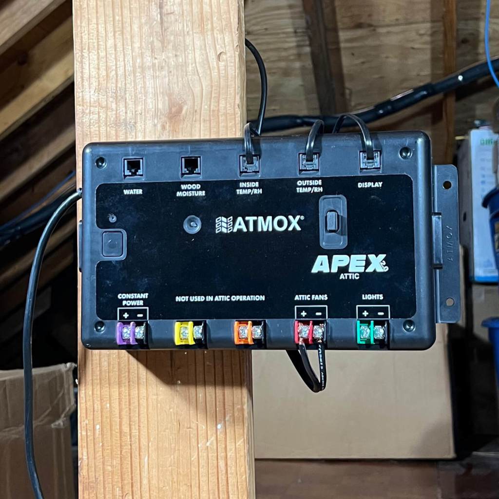 Photo of ATMOX ACE Controller installed in Attic for moisture and heat control