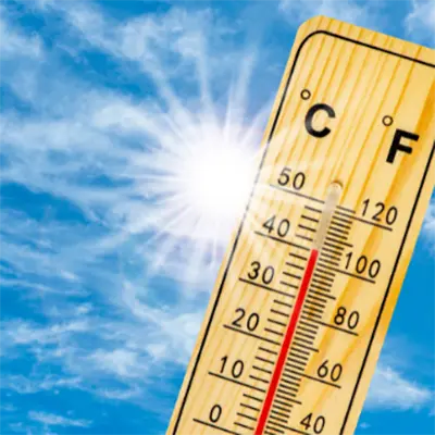 Picture of the sun shining on a thermometer